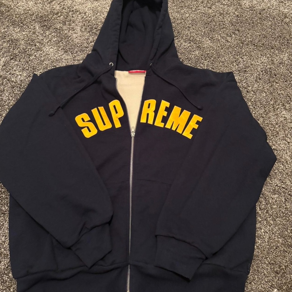Navy Supreme Jacket with Yellow Logo